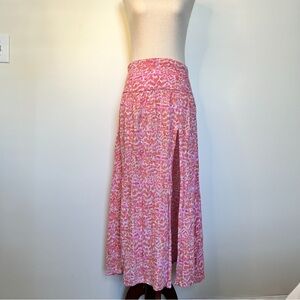 Pink high waisted midi skirt with front slit size small